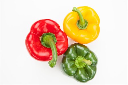 simsearch:400-06864396,k - Red green and yellow peppers on white background Stock Photo - Budget Royalty-Free & Subscription, Code: 400-06864390