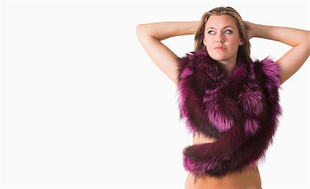 fur stole fashion - Blonde in pink stole holding her hair Stock Photo - Budget Royalty-Free & Subscription, Code: 400-06864546