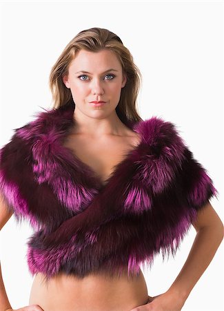 fur stole fashion - Blonde wearing a fur stole and looking at camera Stock Photo - Budget Royalty-Free & Subscription, Code: 400-06864543