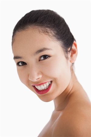 simsearch:400-06890736,k - Young woman smiling with red lips on white background Stock Photo - Budget Royalty-Free & Subscription, Code: 400-06864730