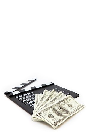 film making - Slate and money lying against white background Stock Photo - Budget Royalty-Free & Subscription, Code: 400-06864772