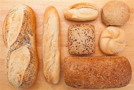 sesame bagel - Various breads on wooden table Stock Photo - Budget Royalty-Free & Subscription, Code: 400-06864816