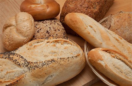 sesame bagel - Different types of bread on a wooden table Stock Photo - Budget Royalty-Free & Subscription, Code: 400-06864813