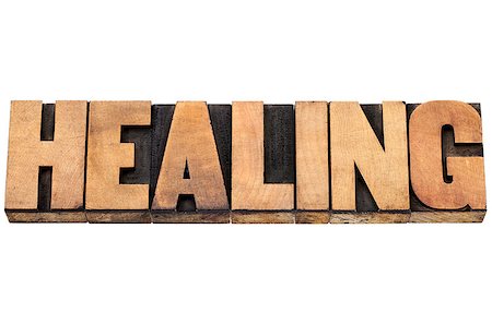 simsearch:400-08223086,k - healing word  - isolated text in letterpress wood type Photographie de stock - Aubaine LD & Abonnement, Code: 400-06864942