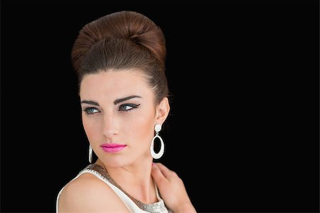 Woman made up in a sixtes mod style on black background Stock Photo - Budget Royalty-Free & Subscription, Code: 400-06865020