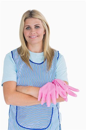 simsearch:400-06866097,k - Cleaner woman crossing her arms in the white background Foto de stock - Super Valor sin royalties y Suscripción, Código: 400-06866078