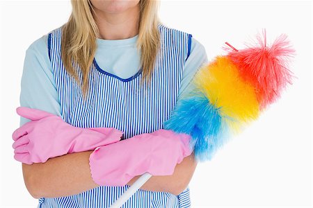 simsearch:400-06866097,k - Cleaning woman holding feather duster in the white background Foto de stock - Super Valor sin royalties y Suscripción, Código: 400-06866107