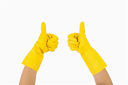 rubber hand gloves - Female hands in rubber gloves showing thumbs up Stock Photo - Budget Royalty-Free & Subscription, Code: 400-06866374