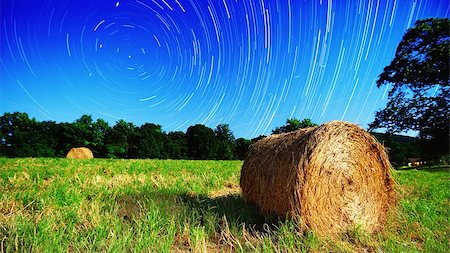 Moonlit hay bale under star trails on a farm in North Georgia, USA. Stock Photo - Budget Royalty-Free & Subscription, Code: 400-06866507