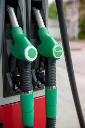 simsearch:400-06946554,k - Close up of two green power gasoline pump Foto de stock - Royalty-Free Super Valor e Assinatura, Número: 400-06867005