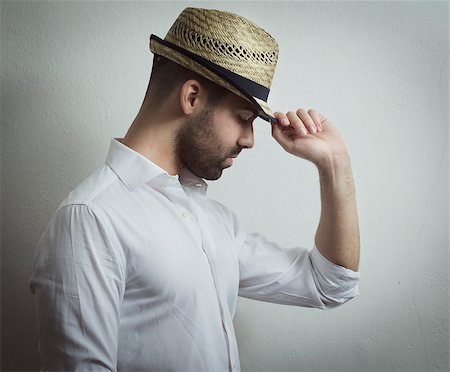 Young attractive man with modern hat Stock Photo - Budget Royalty-Free & Subscription, Code: 400-06867251