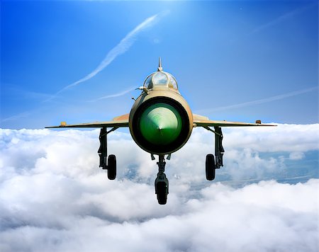 person in aerospace - MiG-21  Soviet multipurpose jet plane in flight Stock Photo - Budget Royalty-Free & Subscription, Code: 400-06867518