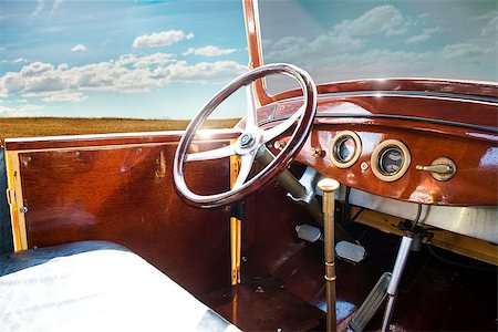 pictures old car dashboard - Old vintage retro car interior. Blue sky Stock Photo - Budget Royalty-Free & Subscription, Code: 400-06867813