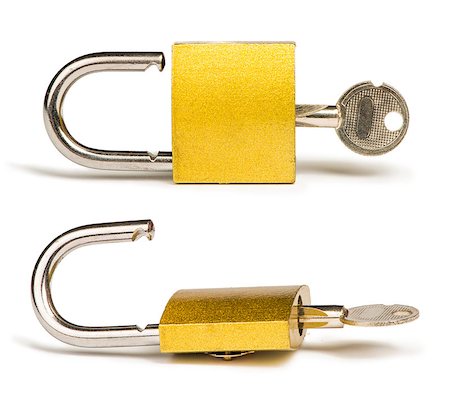 simsearch:400-04212998,k - Yellow padlock and keys isolated studio shot Foto de stock - Royalty-Free Super Valor e Assinatura, Número: 400-06867827