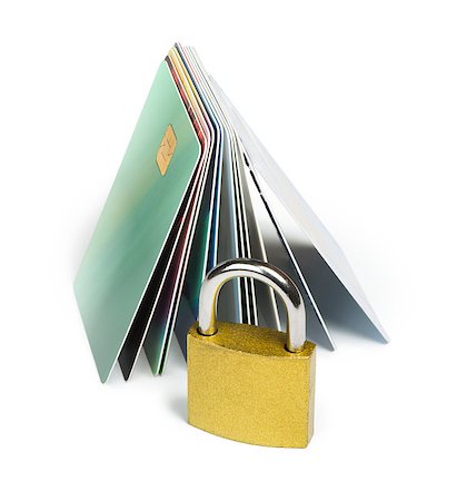 simsearch:400-08116510,k - Grey locked padlock and credit cards. Isolated studio shot. Stock Photo - Budget Royalty-Free & Subscription, Code: 400-06867838