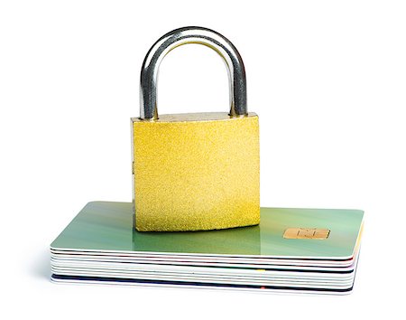 simsearch:400-04994290,k - Grey locked padlock and credit cards. Isolated studio shot. Fotografie stock - Microstock e Abbonamento, Codice: 400-06867839