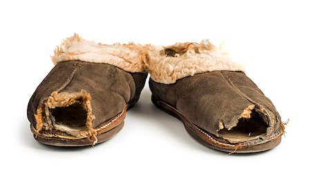 deyangeorgiev (artist) - Old torn boots of leather with a hole. Fotografie stock - Microstock e Abbonamento, Codice: 400-06867863