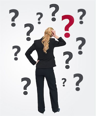 Businesswoman thinking with back to camera on white background with question marks Stock Photo - Budget Royalty-Free & Subscription, Code: 400-06868459