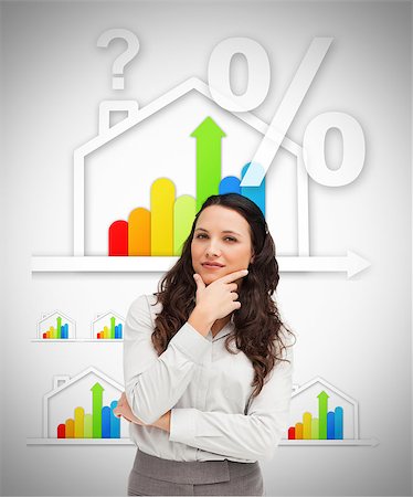 simsearch:400-06869489,k - Smiling woman standing against energy efficient house graphic on white background Photographie de stock - Aubaine LD & Abonnement, Code: 400-06869505