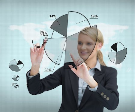 simsearch:400-06802290,k - Smiling businesswoman touching screen with graphs Stock Photo - Budget Royalty-Free & Subscription, Code: 400-06869588