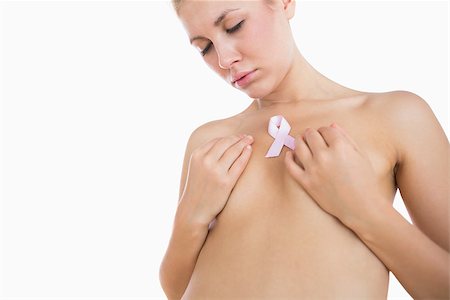 simsearch:400-06870717,k - Naked young woman representing breast cancer awareness over white background Stock Photo - Budget Royalty-Free & Subscription, Code: 400-06869940