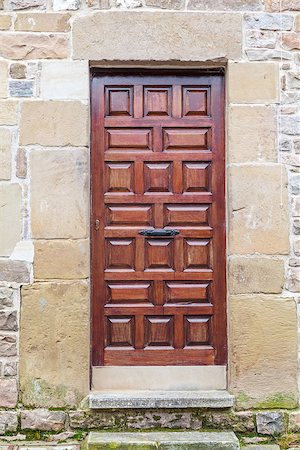 simsearch:400-06891819,k - Ancient wooden door with stone frame Photographie de stock - Aubaine LD & Abonnement, Code: 400-06860207