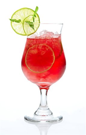 red cocktail with ice and lime  decorated with lime and mint Stock Photo - Budget Royalty-Free & Subscription, Code: 400-06860290