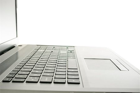 simsearch:400-07570955,k - Closeup of laptop keyboard. Isolated over white background. Stock Photo - Budget Royalty-Free & Subscription, Code: 400-06860400