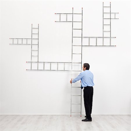 simsearch:400-04029058,k - Career choices and opportunities concept - businessman with branched ladder Stock Photo - Budget Royalty-Free & Subscription, Code: 400-06860462