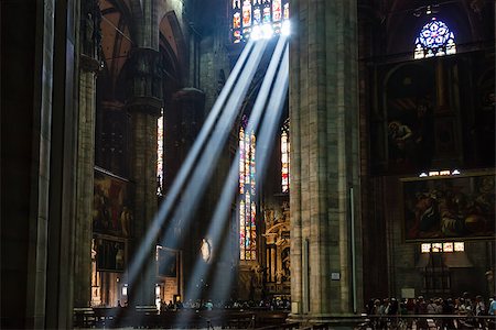 The Bright Beam of Light Inside Milan Cathedral, Italy Foto de stock - Royalty-Free Super Valor e Assinatura, Número: 400-06860499
