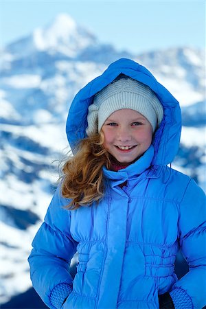 Happy girl portrait on winter  mountain background. Foto de stock - Super Valor sin royalties y Suscripción, Código: 400-06861032