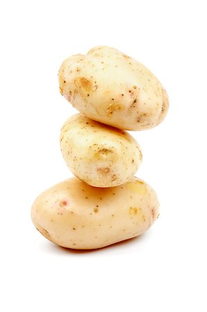 simsearch:400-06485810,k - Stack of Three Raw New Harvest Potato isolated on white background Fotografie stock - Microstock e Abbonamento, Codice: 400-06861939