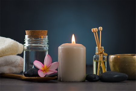 flame lily - Spa concept in dark background with ambient lights , cold stones and frangipani Stock Photo - Budget Royalty-Free & Subscription, Code: 400-06862286