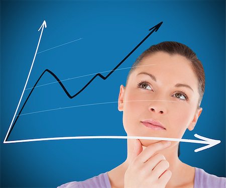 simsearch:400-06869489,k - Woman looking at a chart against blue background Photographie de stock - Aubaine LD & Abonnement, Code: 400-06862503