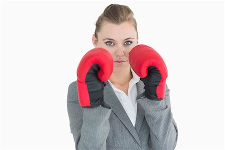 portrait of woman wearing boxing gloves - Portrait of businesswoman wearing boxing gloves Stock Photo - Budget Royalty-Free & Subscription, Code: 400-06862570