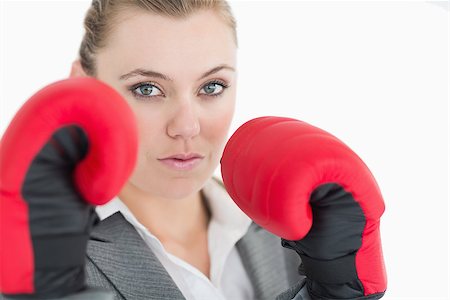 Businesswoman in boxing gloves ready to fight Stock Photo - Budget Royalty-Free & Subscription, Code: 400-06862572