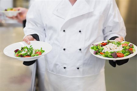 simsearch:400-06863053,k - Chef presenting two salads in a kitchen Stockbilder - Microstock & Abonnement, Bildnummer: 400-06863036