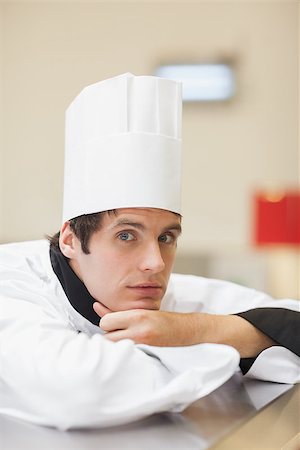 simsearch:400-06863195,k - Thoughtful chef in the kitchen Foto de stock - Super Valor sin royalties y Suscripción, Código: 400-06863207