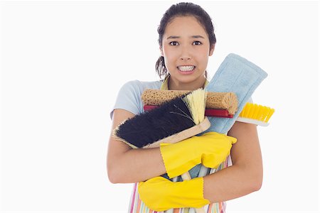 simsearch:400-06863562,k - Woman holding mops and brushes with them nearly falling Stockbilder - Microstock & Abonnement, Bildnummer: 400-06863569