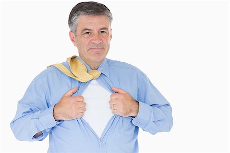 person opening shirt - Businessman opening shirt like a superhero on white background Stock Photo - Budget Royalty-Free & Subscription, Code: 400-06863814