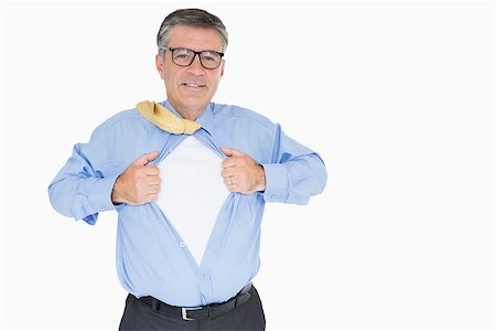 person opening shirt - Happy man with glasses is pulling his shirt with his hands like a superhero Stock Photo - Budget Royalty-Free & Subscription, Code: 400-06863818