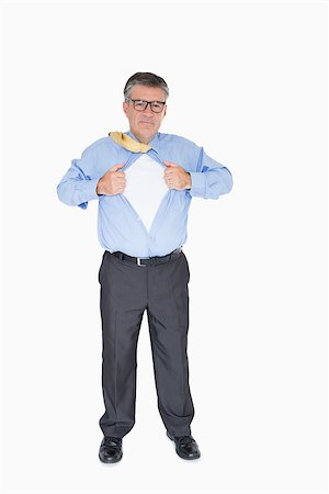 person opening shirt - Businessman with glasses is pulling his shirt with his hands like a superhero Stock Photo - Budget Royalty-Free & Subscription, Code: 400-06863819