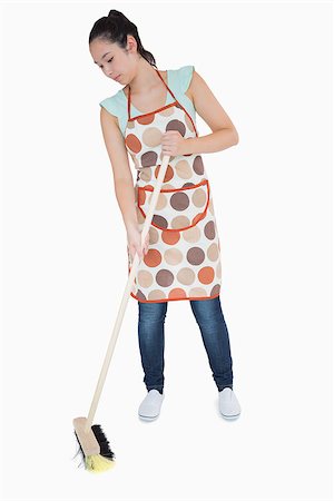 picture of a lady sweeping the floor - Woman sweeping the floor on a white background Stock Photo - Budget Royalty-Free & Subscription, Code: 400-06863962