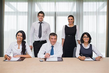Happy business team in conference room Stock Photo - Budget Royalty-Free & Subscription, Code: 400-06874000
