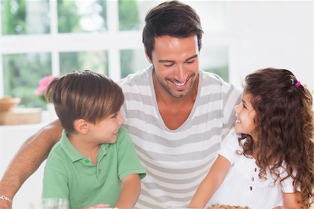 simsearch:400-06871178,k - Two children and their father in kitchen Stock Photo - Budget Royalty-Free & Subscription, Code: 400-06874198