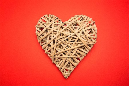 simsearch:400-06873734,k - Wicker heart on red background Stock Photo - Budget Royalty-Free & Subscription, Code: 400-06874261