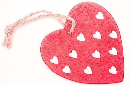 simsearch:400-06873734,k - Pink heart ornament on white background Stock Photo - Budget Royalty-Free & Subscription, Code: 400-06874357