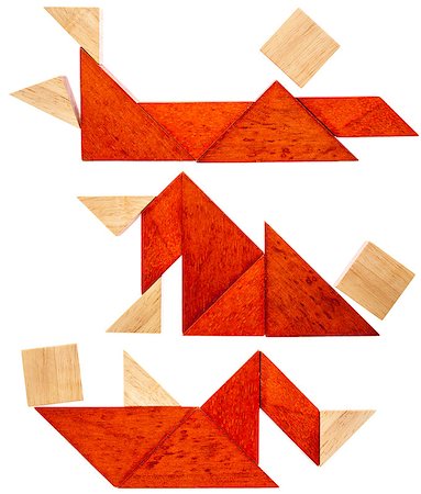 simsearch:400-07774007,k - three abstract figures lying down and resting  built from seven tangram wooden pieces, a traditional Chinese puzzle game Foto de stock - Royalty-Free Super Valor e Assinatura, Número: 400-06875292