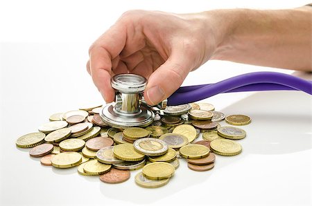 simsearch:400-06860365,k - Solution to financial crisis concept. Male hand with stethoscope on Euro coins. Stock Photo - Budget Royalty-Free & Subscription, Code: 400-06875357