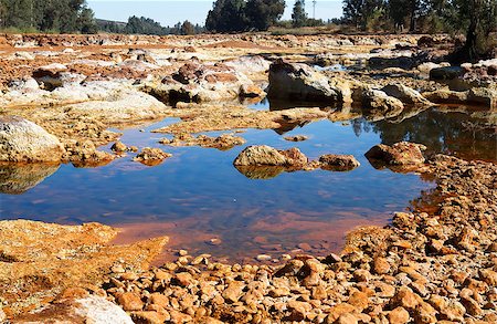 big stones in acidic river Tinto in Niebla (Huelva), Spain Photographie de stock - Aubaine LD & Abonnement, Code: 400-06875446